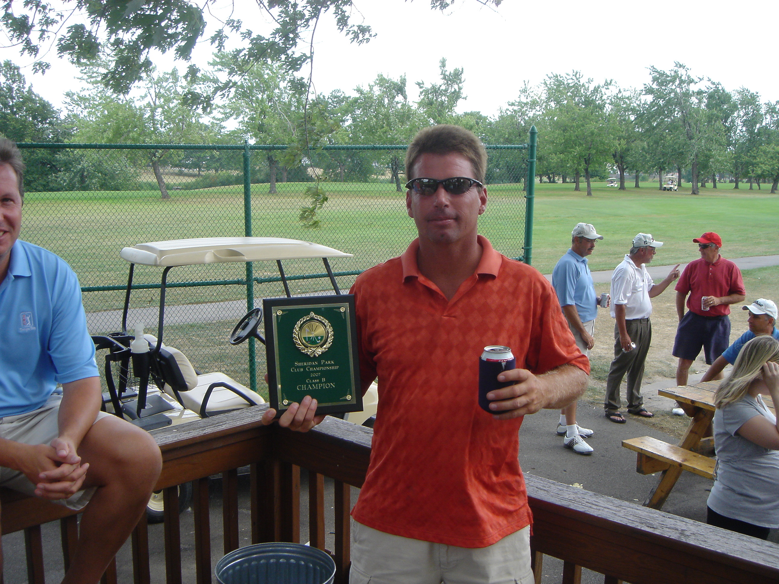 Tim Dean with his Champions plaque